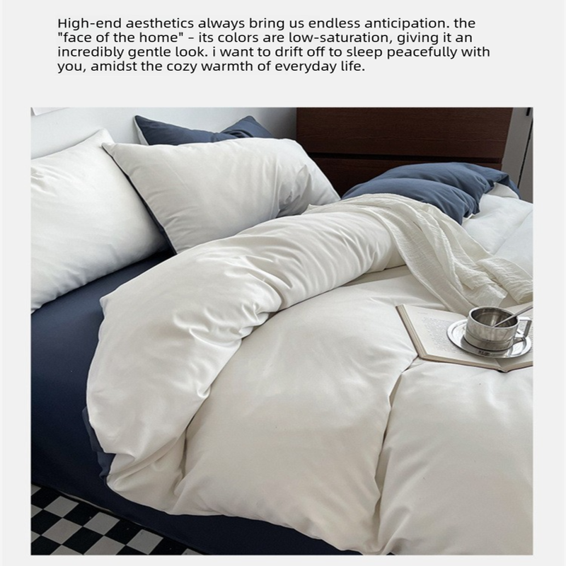 Light grey washed cotton bedding set made up on a bed
