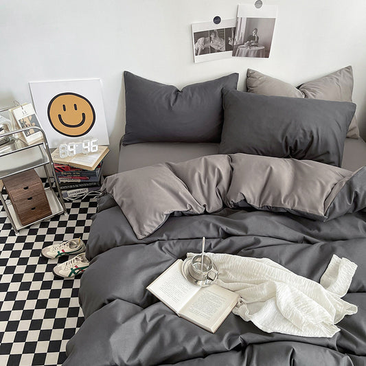 Dark gray and light gray washed cotton bedding set with duvet cover, fitted sheet and two pillowcases