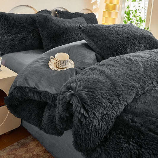 Dark grey 4 piece bedding set with plush faux fur finish and matching pillowcases