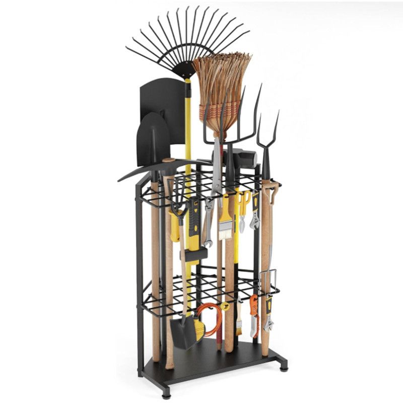 Triangular metal corner rack holding garden tools upright in a shed