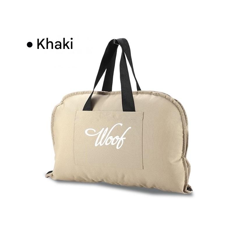 Khaki foldable pet bed mat with carry handles and plush sleeping surface