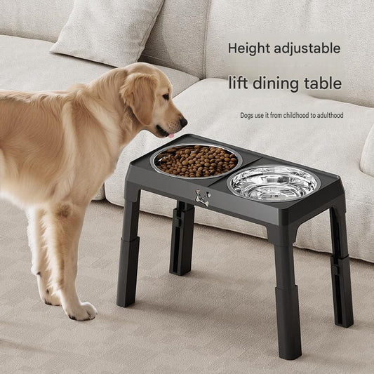 Black elevated double dog bowl stand with stainless bowls and a grooming comb