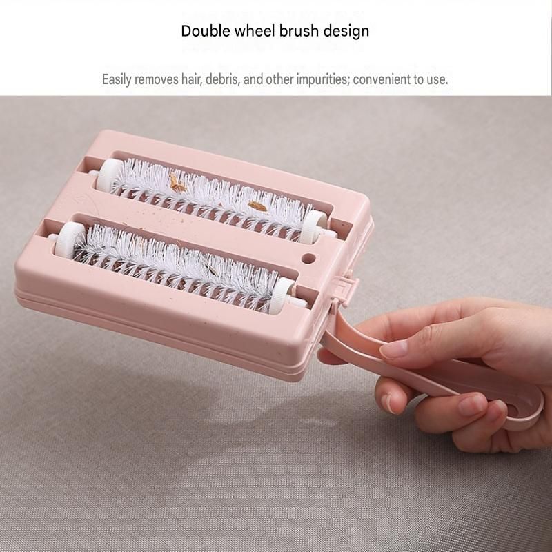 White cordless dust mite vacuum beside a beige double roller carpet brush