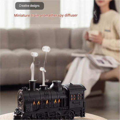 Retro train-shaped humidifier with LED night light, dual mist nozzles and brass-toned finish