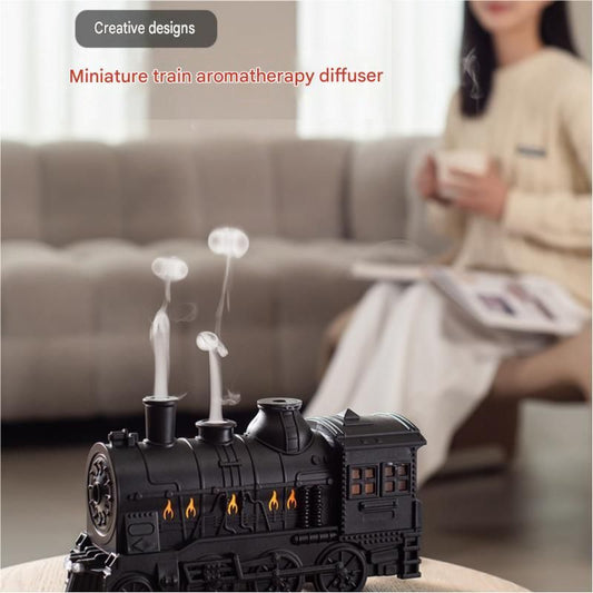 Retro train-shaped humidifier with LED night light, dual mist nozzles and brass-toned finish