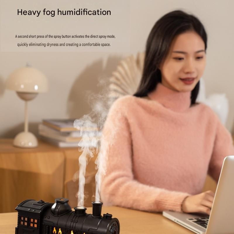 Retro train-shaped humidifier with LED night light, dual mist nozzles and brass-toned finish