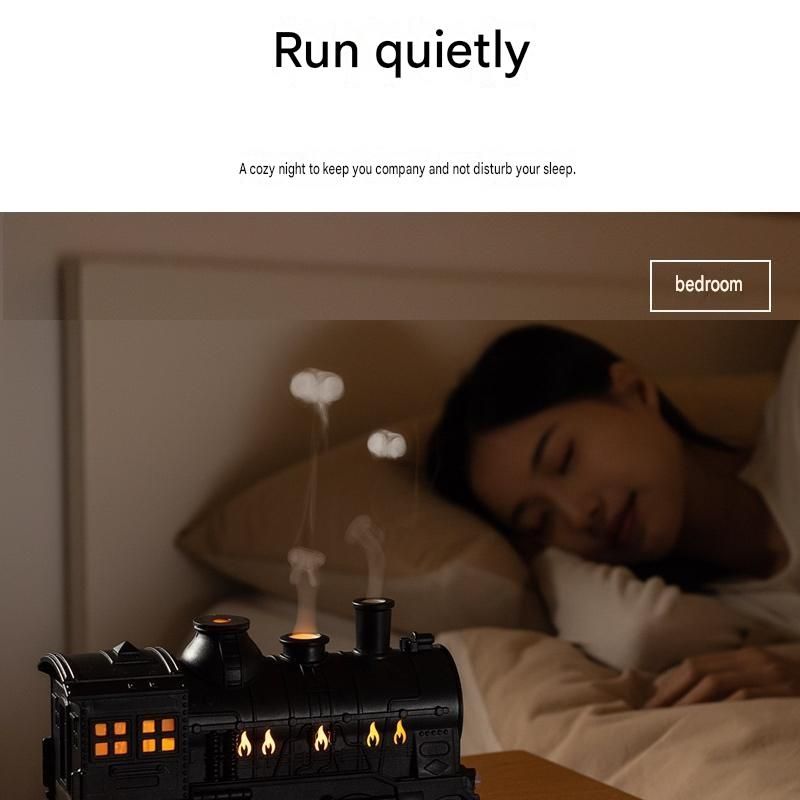 Retro train-shaped humidifier with LED night light, dual mist nozzles and brass-toned finish