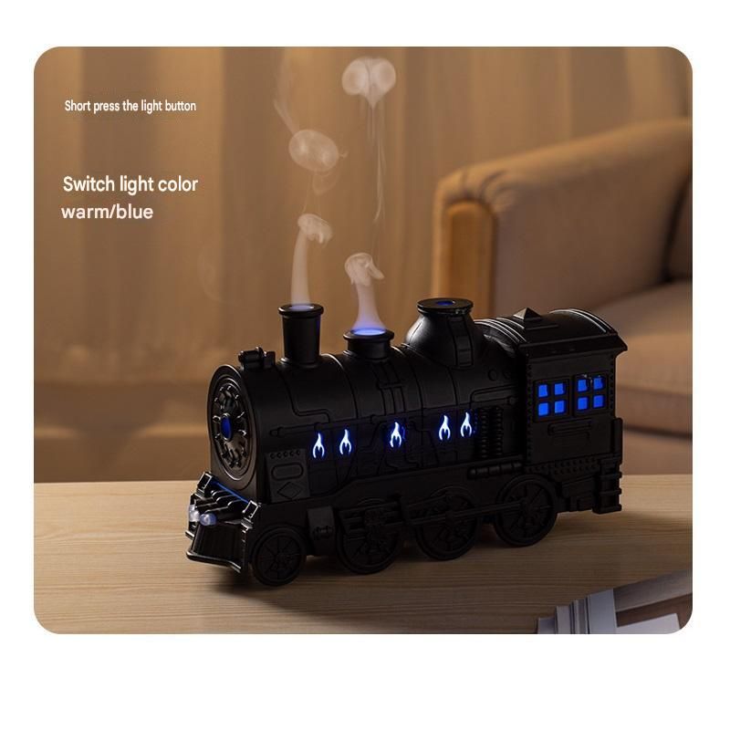 Brass-coloured retro train humidifier with cordless UV mite remover vacuum