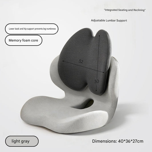 Grey memory foam seat cushion with integrated lumbar backrest on an office chair