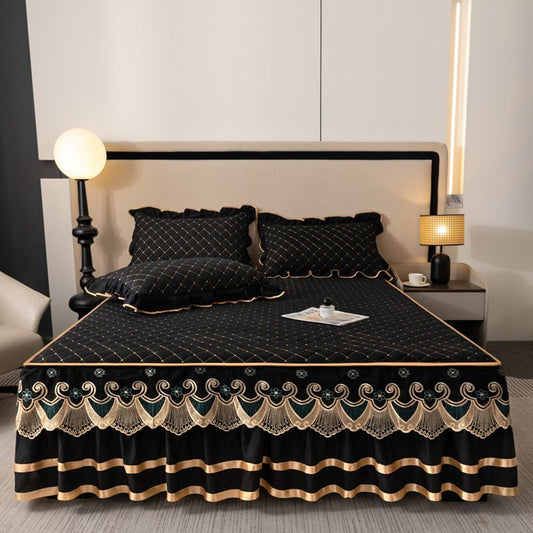Grey and gold quilted bed skirt set with lace trim and two matching pillowcases