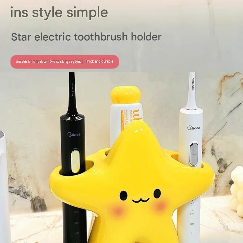 Yellow star bathroom set with plastic toothbrush holder and two ceramic pump bottles