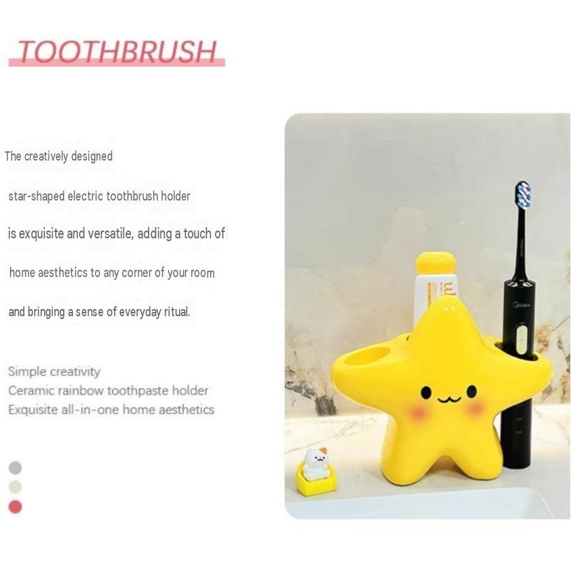 Yellow star bathroom set with plastic toothbrush holder and two ceramic pump bottles