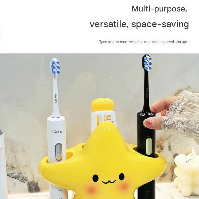 Yellow star bathroom set with plastic toothbrush holder and two ceramic pump bottles