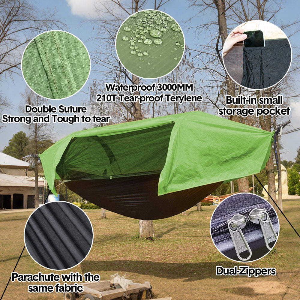 Double camping hammock tent with mosquito net strung between two trees