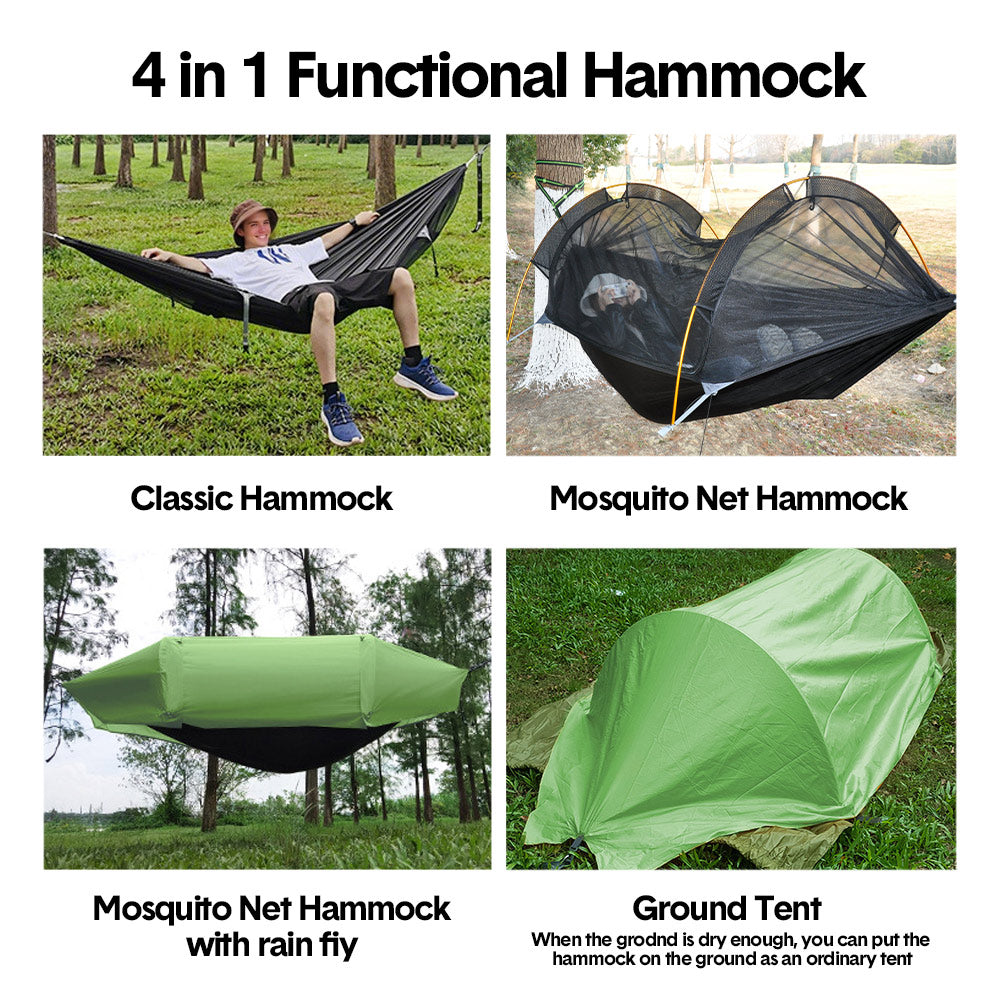 Double camping hammock tent with mosquito net strung between two trees