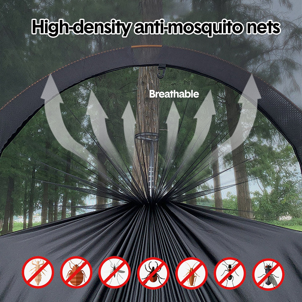 Double camping hammock tent with mosquito net strung between two trees