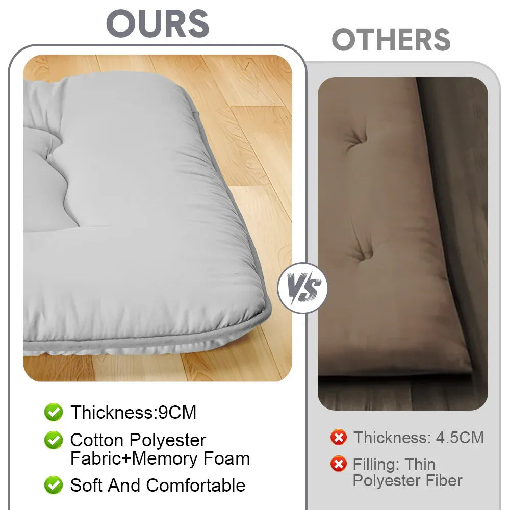 Grey foldable futon mattress with a smooth polyester cover for floor sleeping