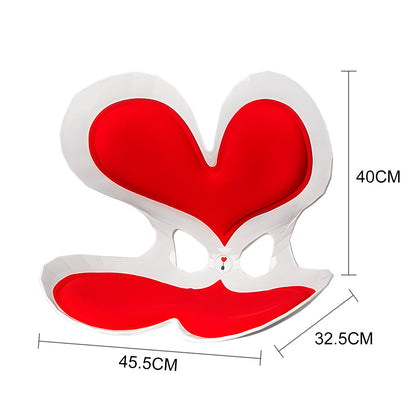 Red heart-shaped ergonomic seat with contoured back and seat support