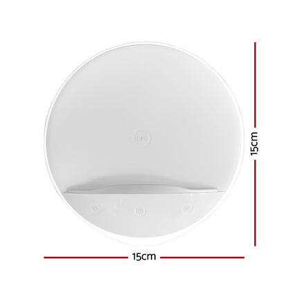 White bedside lamp with touch controls, built-in phone holder and wireless charging base